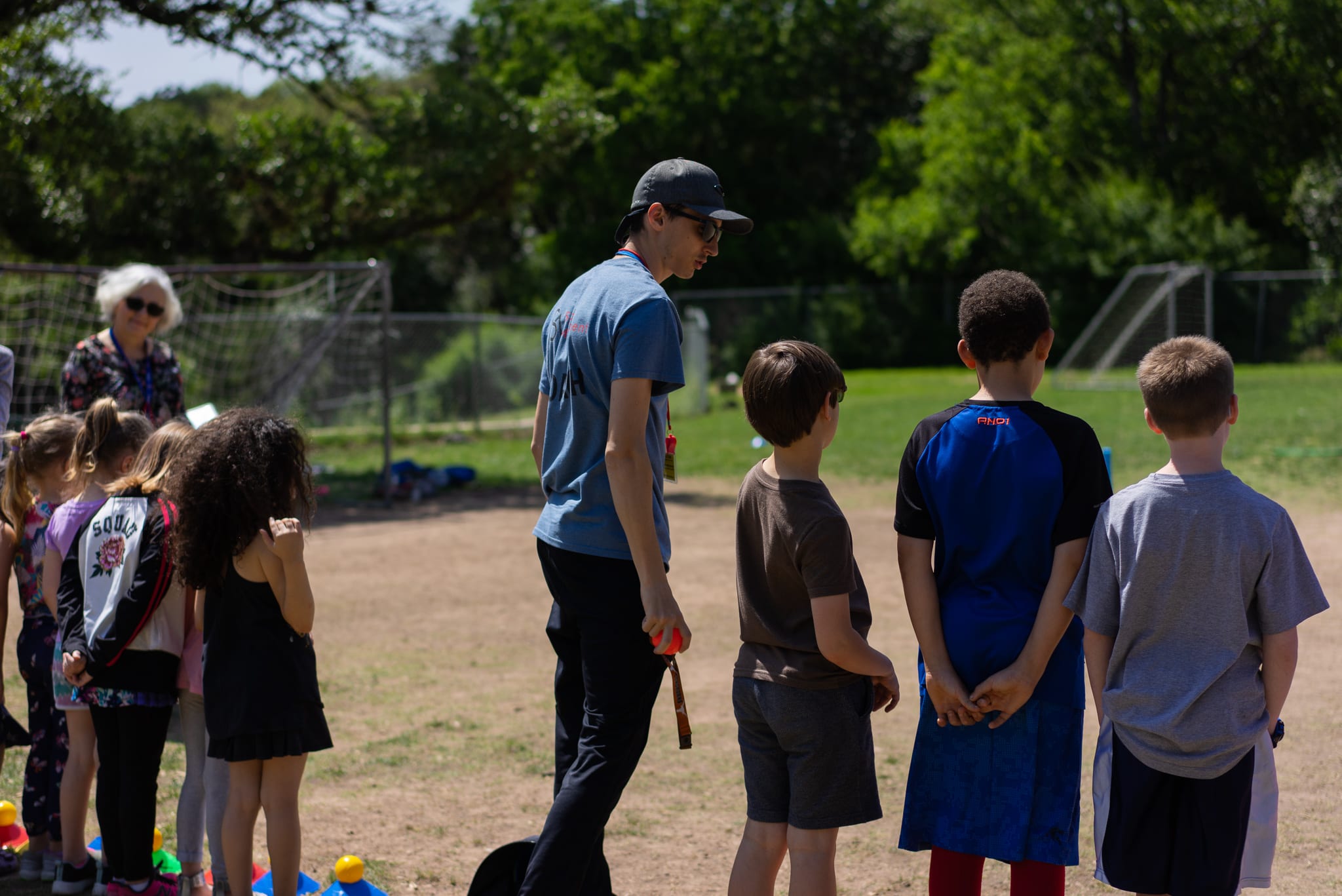 coach Austin lining up students